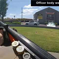 Watch: Ariz. officers confront armed suspect while driving in cruiser