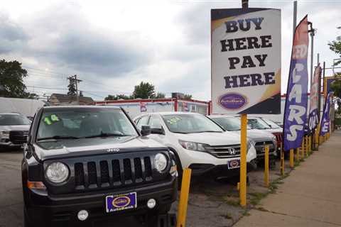 What is a buy here pay here car dealership?